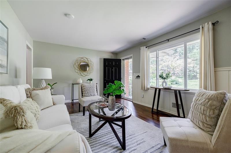 2343 Hunting Valley Drive Decatur, GA 30033 - Photo 12 of 71 a living room with furniture and a large window