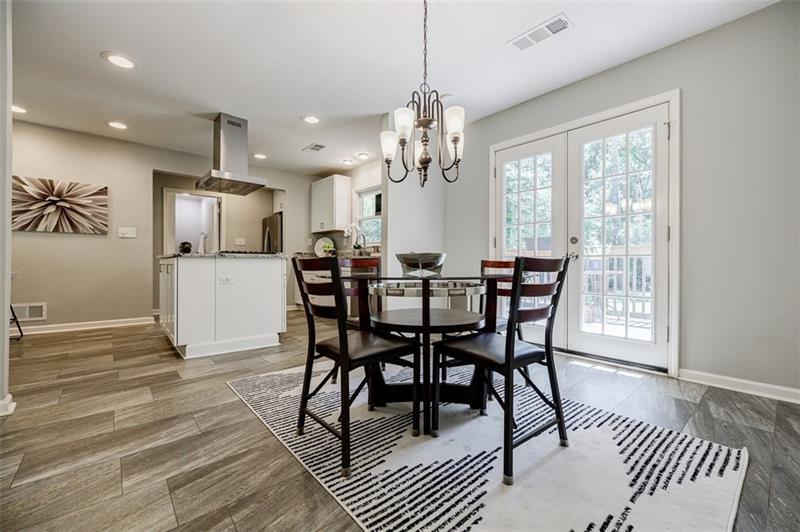 2343 Hunting Valley Drive Decatur, GA 30033 - Photo 25 of 71 a view of a dining room with furniture window and wooden floor