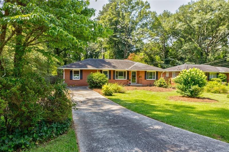 2343 Hunting Valley Drive Decatur, GA 30033 - Photo 3 of 71 a front view of house with yard and green space