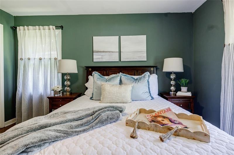 2343 Hunting Valley Drive Decatur, GA 30033 - Photo 31 of 71 a bed sitting in a bedroom next to a window