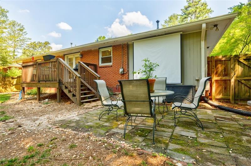 2343 Hunting Valley Drive Decatur, GA 30033 - Photo 46 of 71 a view of an chairs and table in the backyard