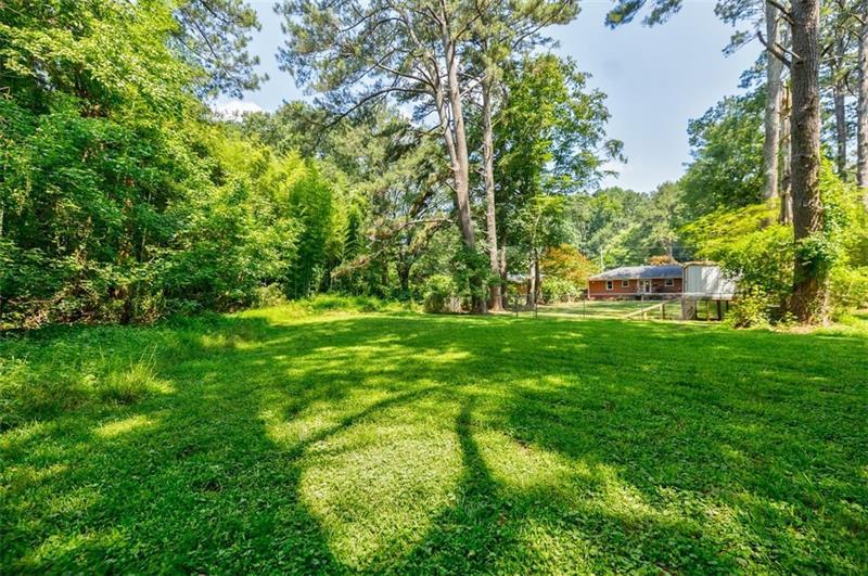 2343 Hunting Valley Drive Decatur, GA 30033 - Photo 50 of 71 a view of green field with trees in the background