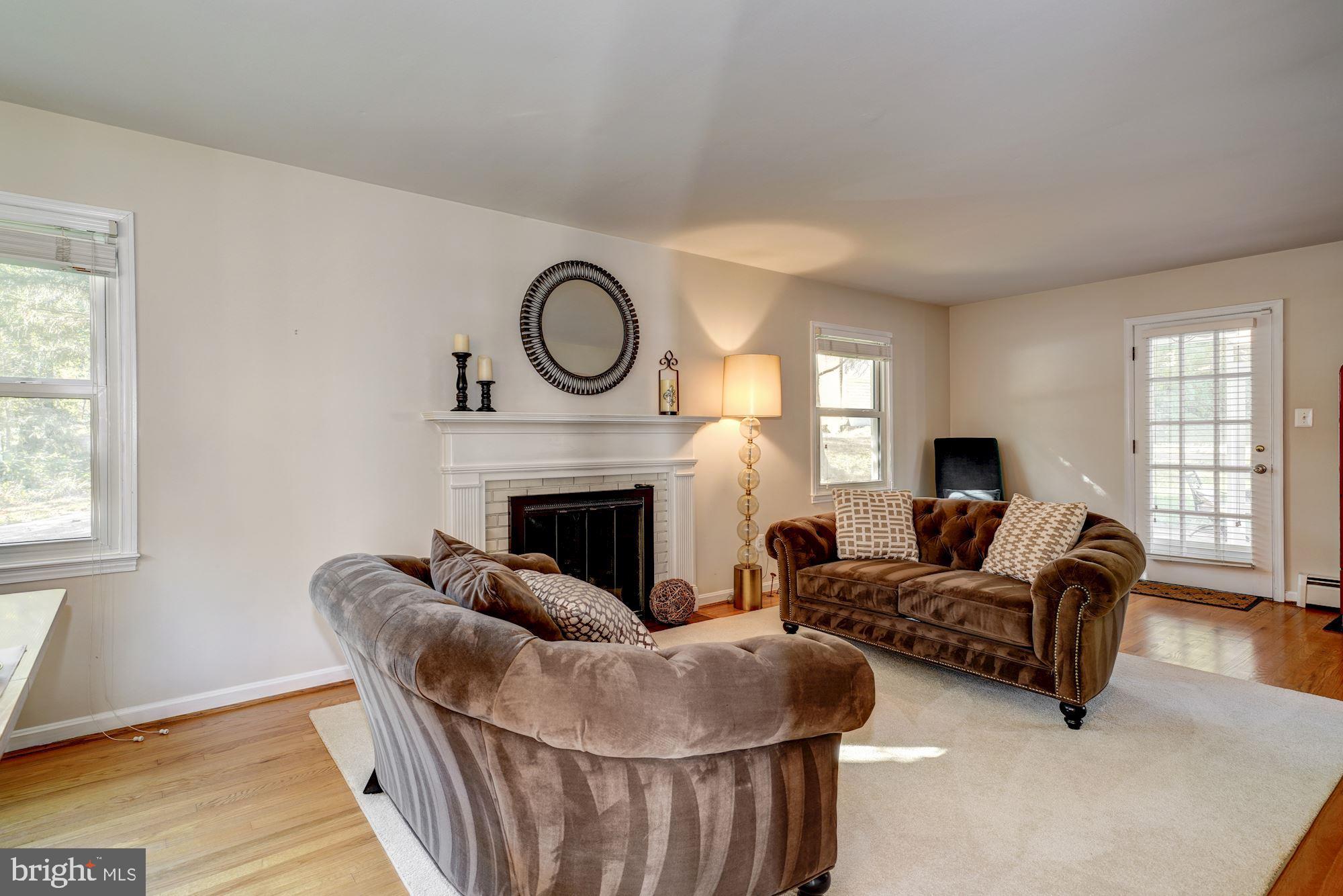 3108 Russell Road Alexandria, VA 22305 - Photo 4 of 45 A spacious LR + gas remote controlled fireplace