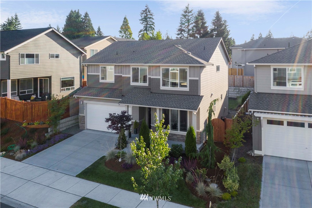 17512 Meridian Place West Bothell, WA 98012 - Photo 1 of 28 a front view of a house with a yard