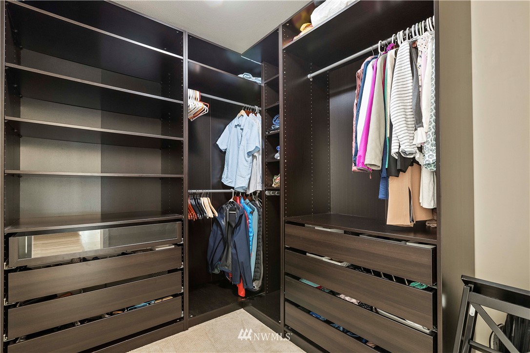 17512 Meridian Place West Bothell, WA 98012 - Photo 19 of 28 a view of walk in closet with clothes and shoes