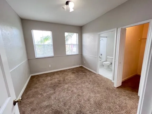 a bathroom with a double vanity sink and mirror