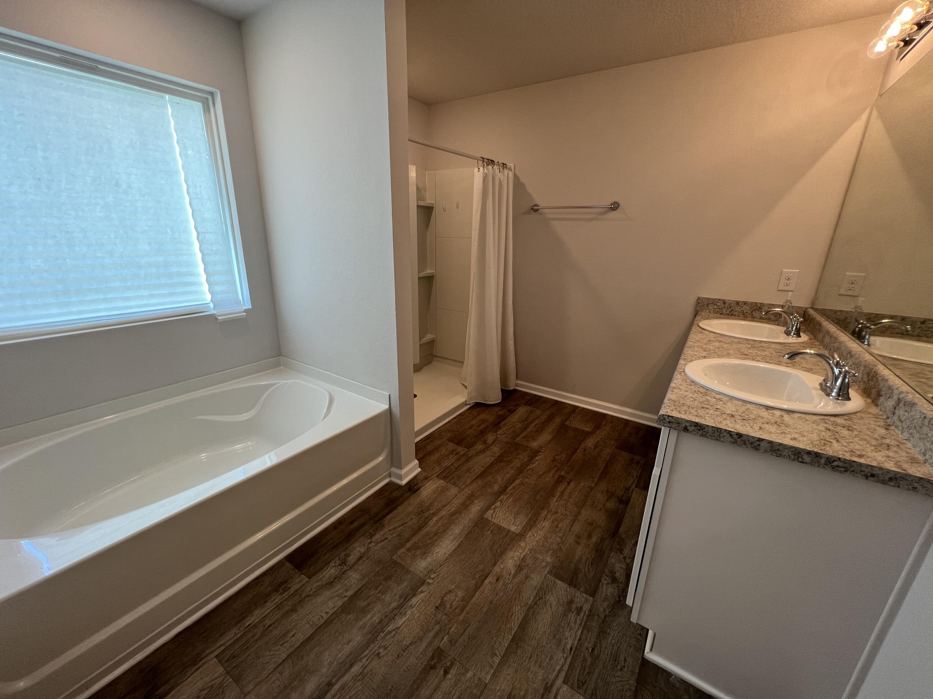 399 This Way Freeport, FL 32439 - Photo 15 of 29 a bathroom with a sink and a mirror