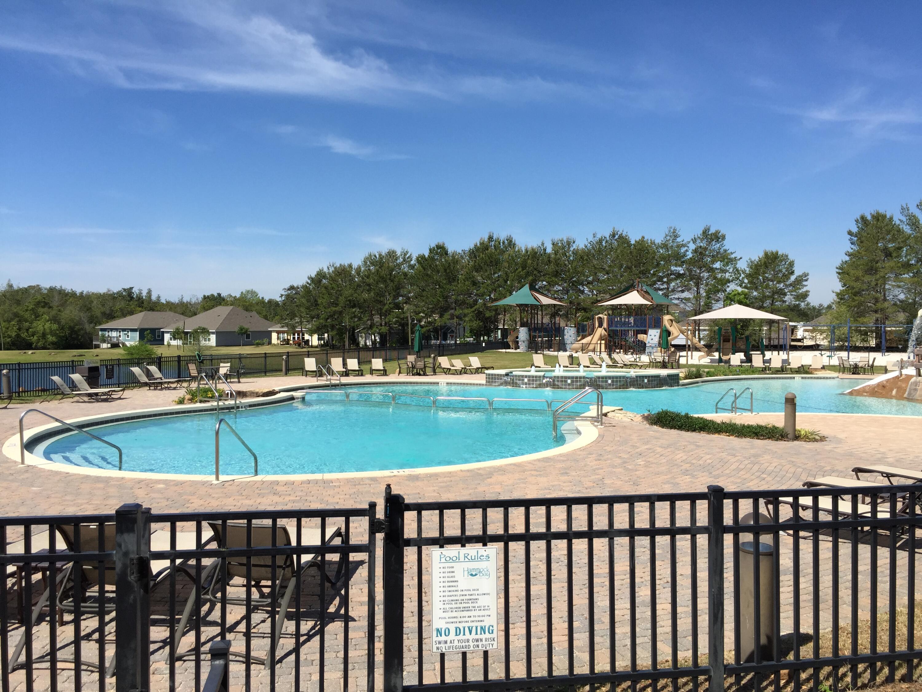 399 This Way Freeport, FL 32439 - Photo 28 of 29 a view of swimming pool from a balcony