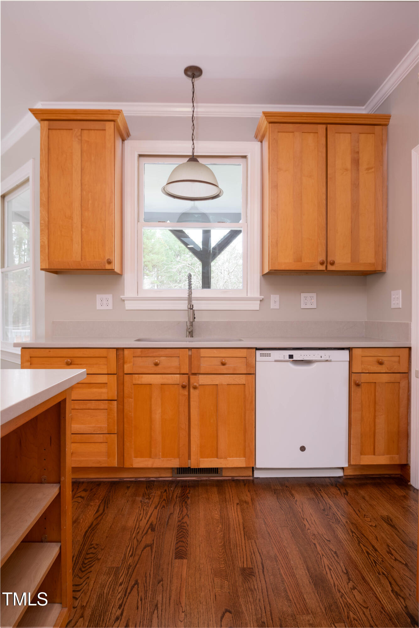 4222 Rogers Road Durham, NC 27703 - Photo 20 of 84 a view of a kitchen with wooden floor and a sink