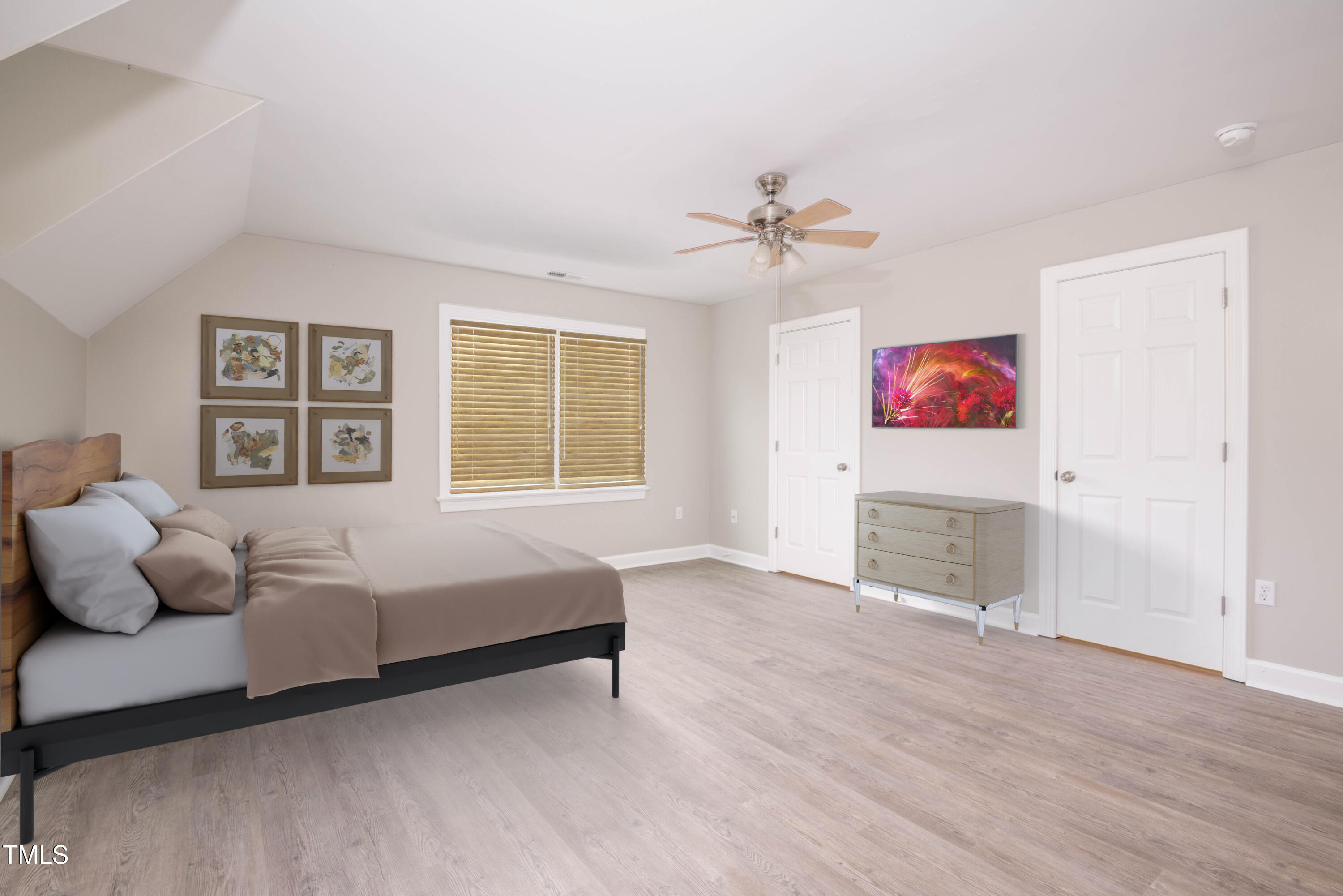 4222 Rogers Road Durham, NC 27703 - Photo 65 of 84 a bedroom with a bed and wooden floor