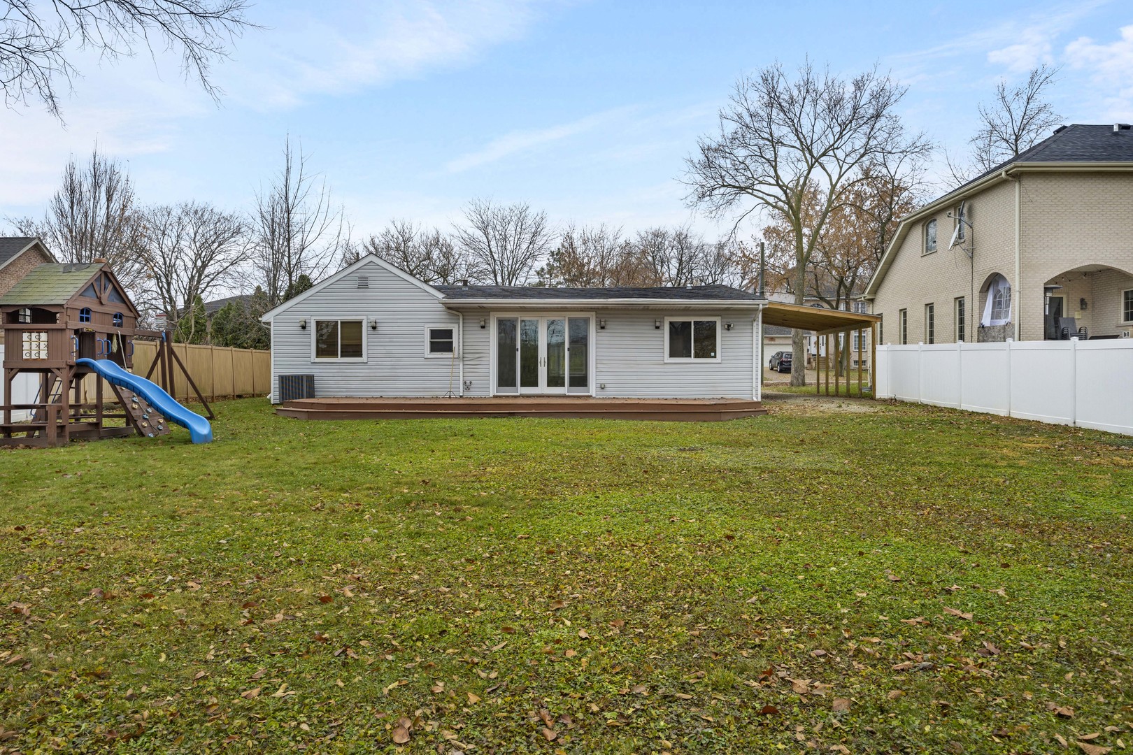 9059 Oneill Drive Burr Ridge, IL 60527 - Photo 2 of 15 a front view of a house with garden