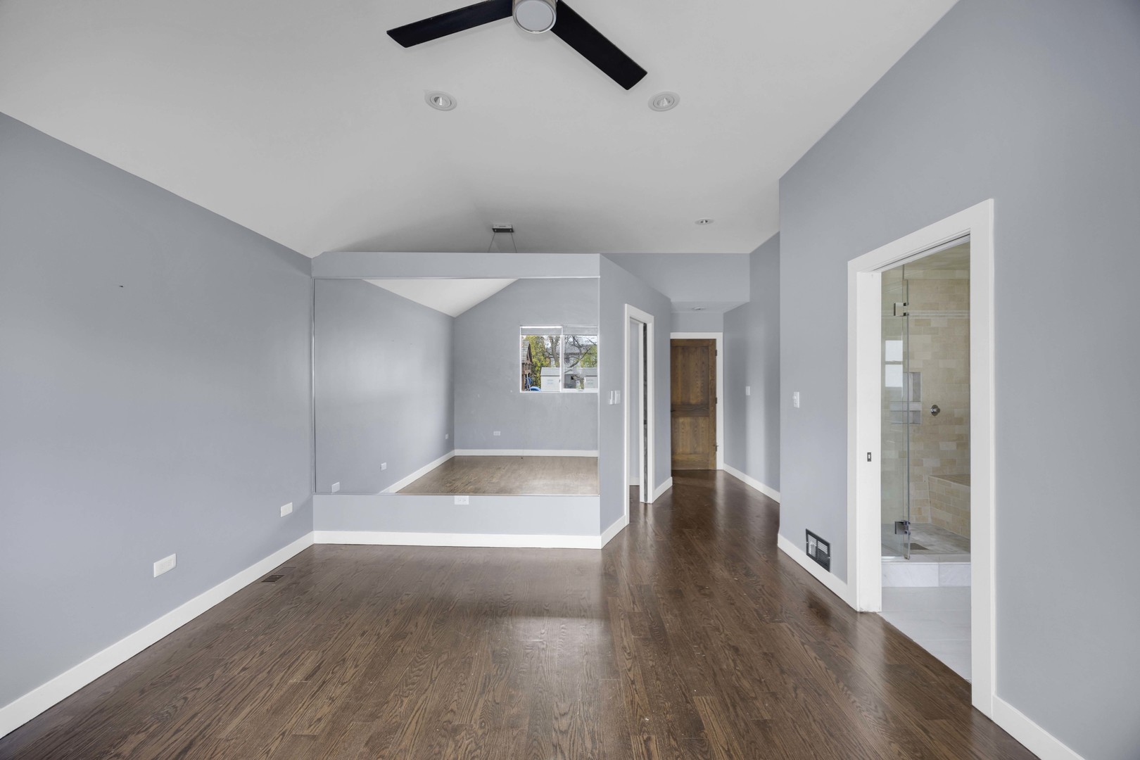 9059 Oneill Drive Burr Ridge, IL 60527 - Photo 6 of 15 wooden floor in an empty room with a window