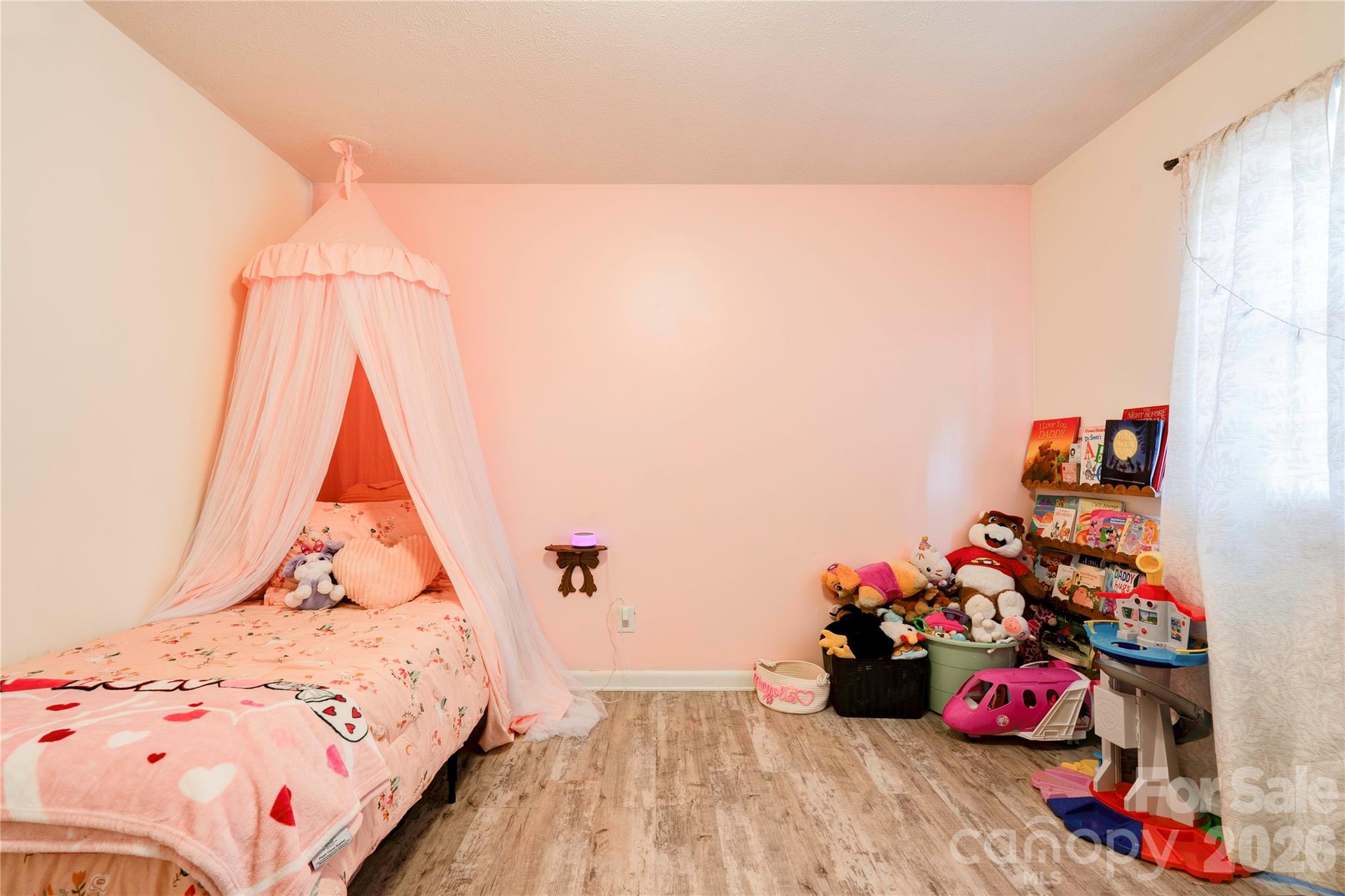 2106 South Post Road Shelby, NC 28152 - Photo 19 of 26 a bedroom with a bed and a window