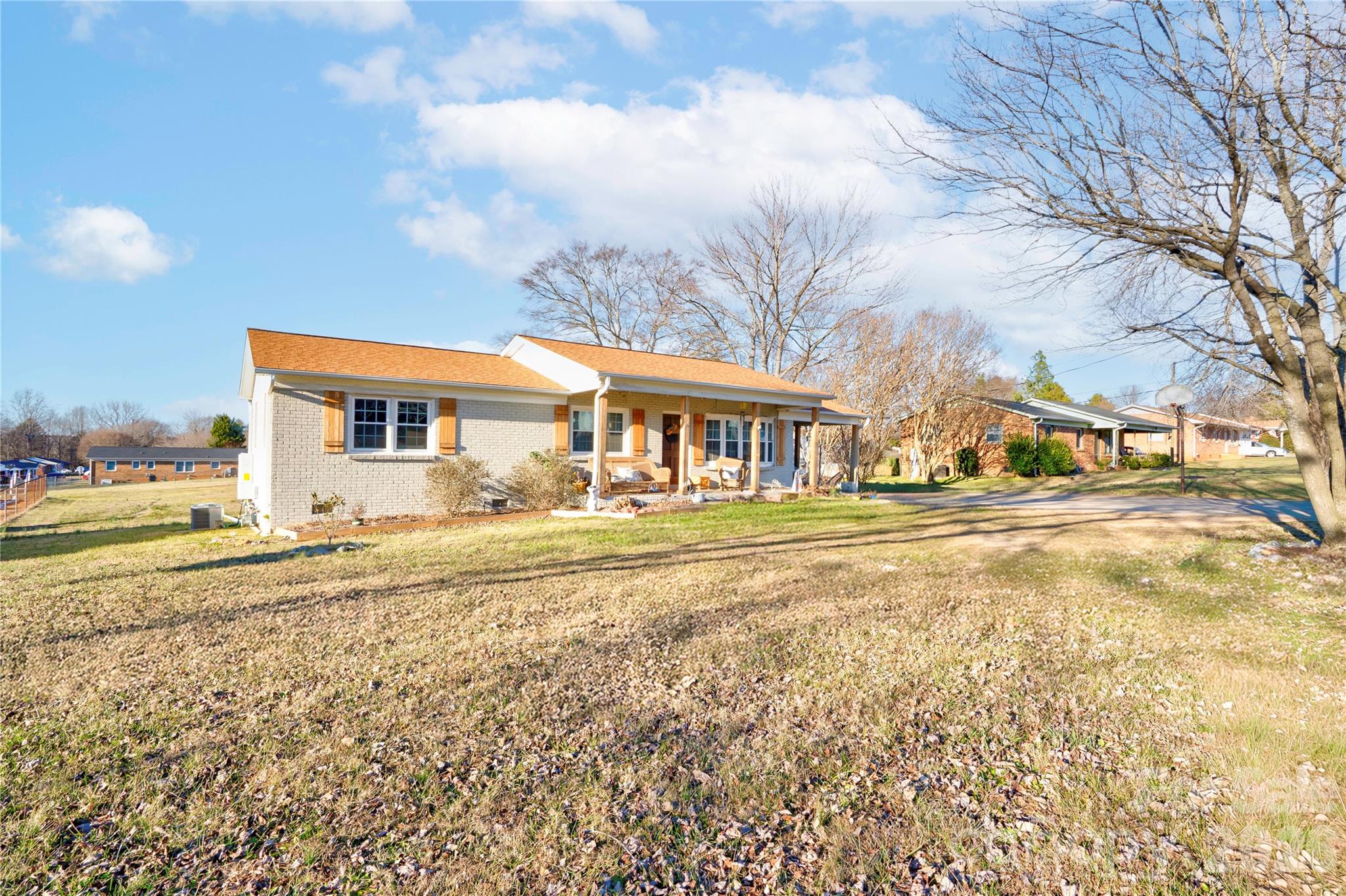 2106 South Post Road Shelby, NC 28152 - Photo 2 of 26 a view of an house with backyard and snow