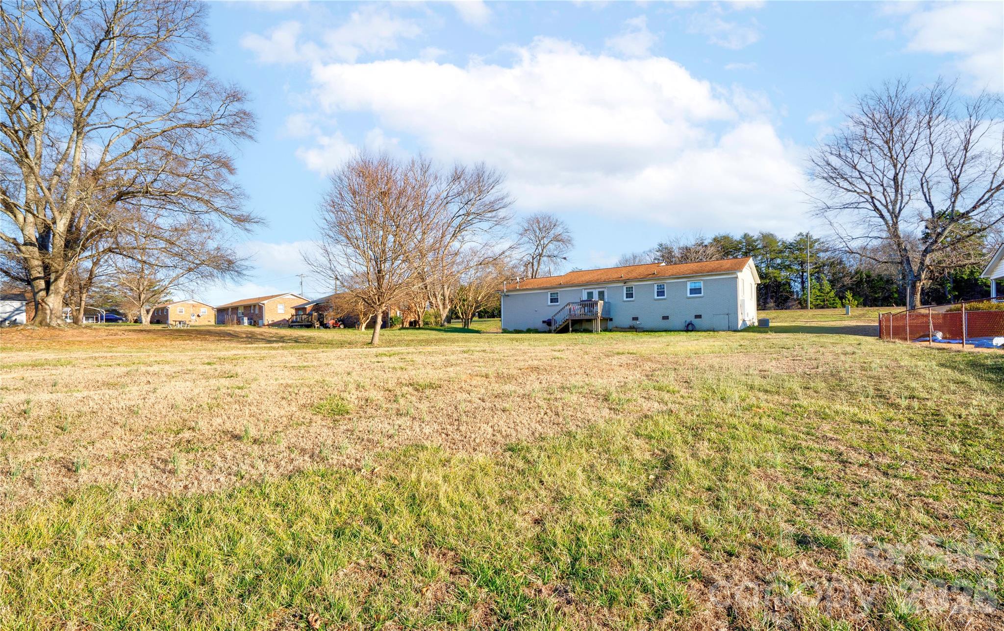 2106 South Post Road Shelby, NC 28152 - Photo 7 of 26 a view of residential houses with yard and trees