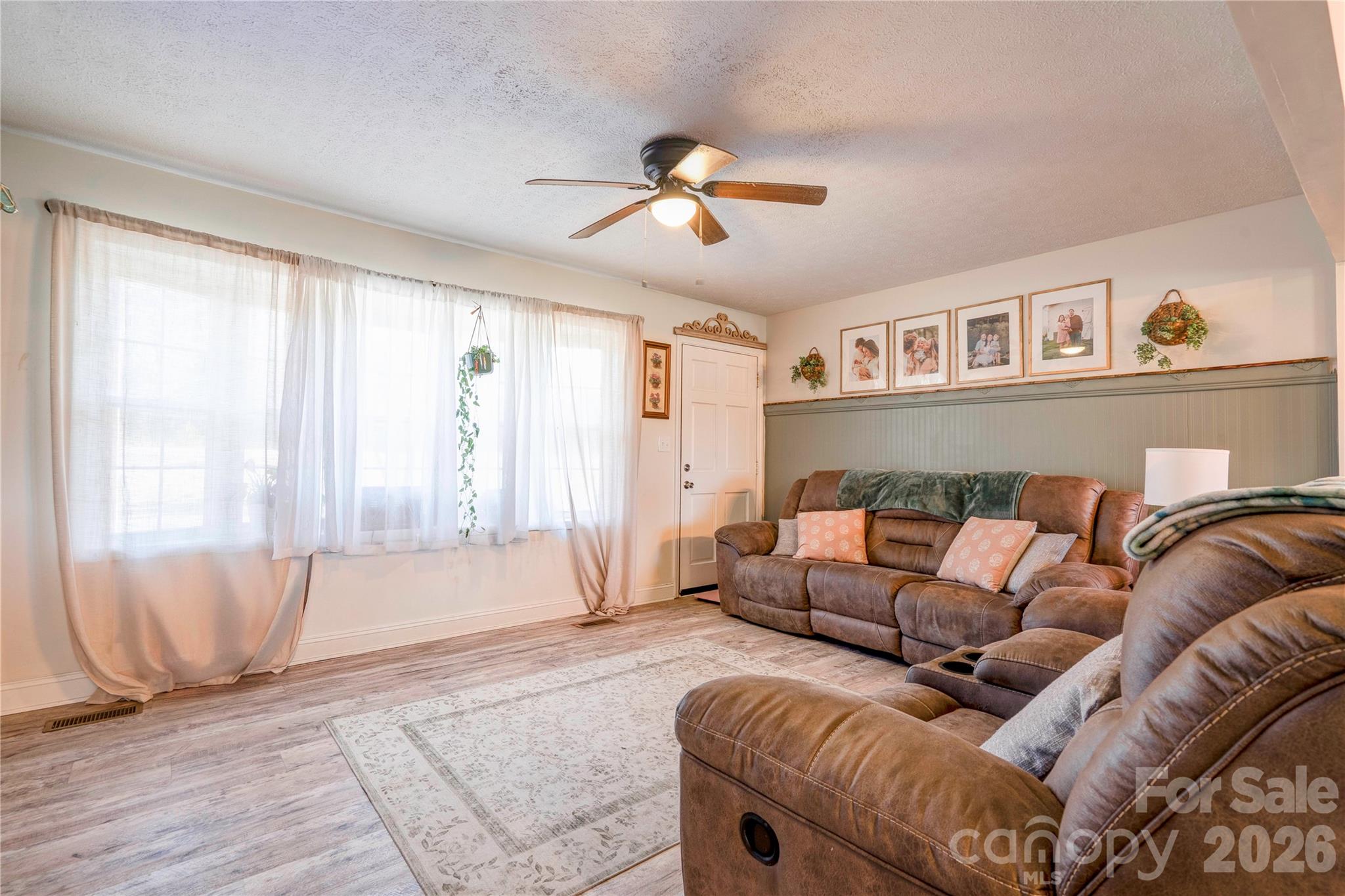 2106 South Post Road Shelby, NC 28152 - Photo 9 of 26 a living room with furniture and a window