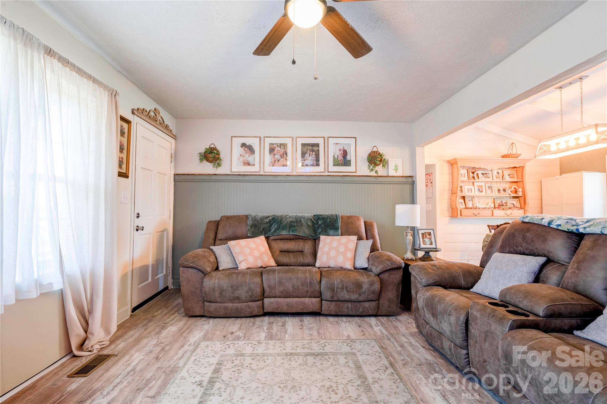 2106 South Post Road Shelby, NC 28152 - Photo 10 of 26 a living room with furniture and a large window
