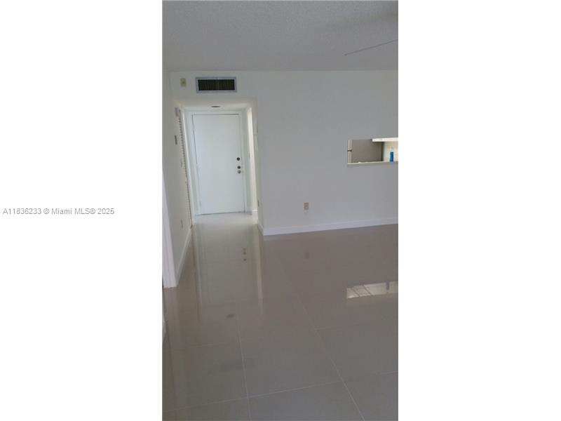 8015 Southwest 107th Avenue, Unit 209 Miami, FL 33173 - Photo 33 of 43 a picture of a small white wall