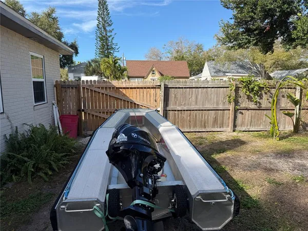 a view of a balcony with floor to ceiling windows