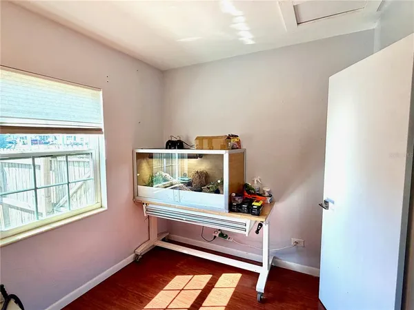 a room with furniture and window