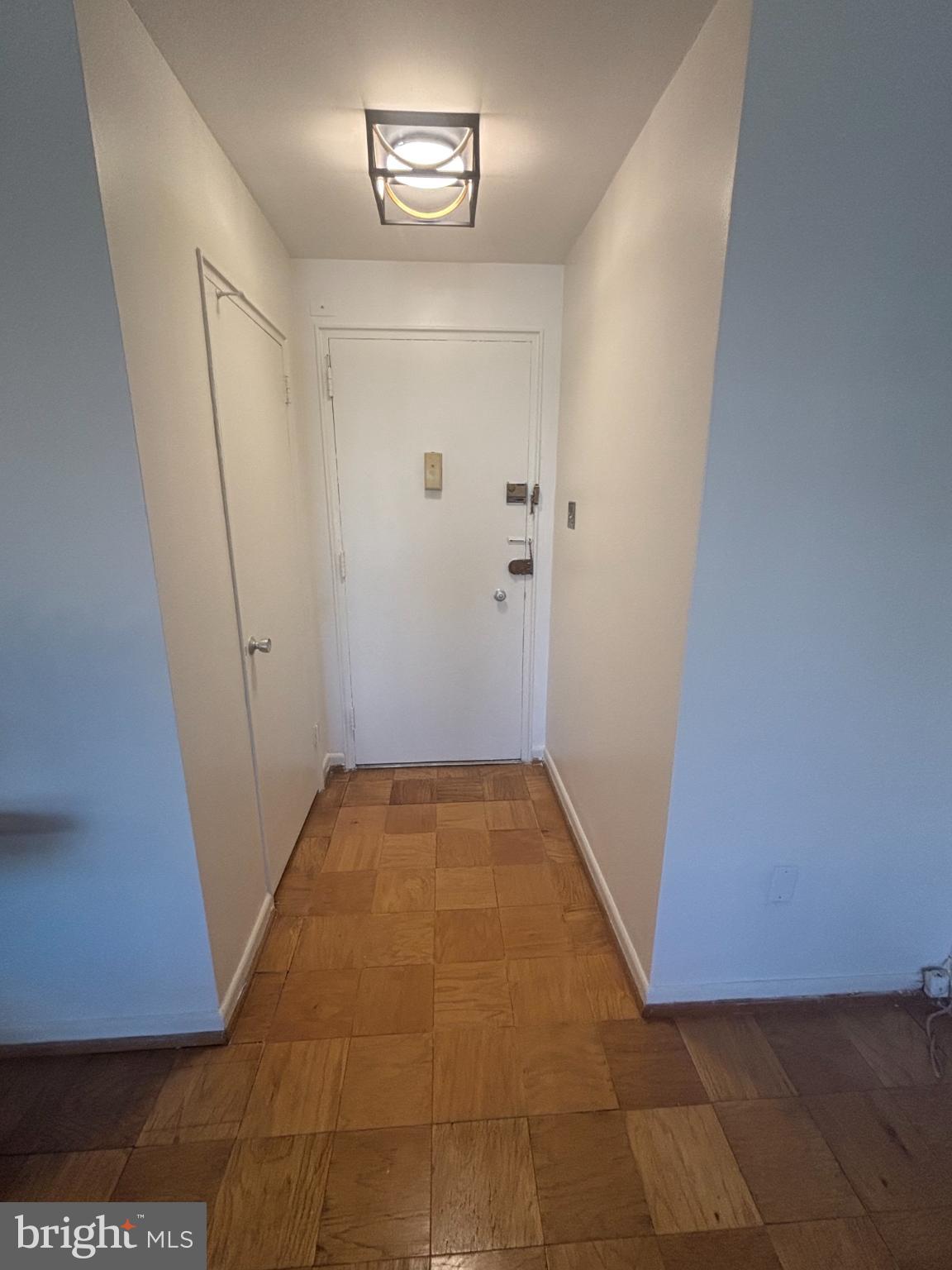 6445 Luzon Avenue Northwest, Unit 501 Washington, DC 20012 - Photo 8 of 21 a view of a hallway
