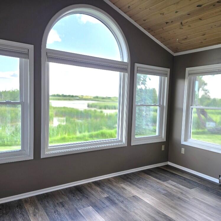 176 Long Rapids Road Alpena, MI 49707 - Photo 12 of 38 Sunroom with a View