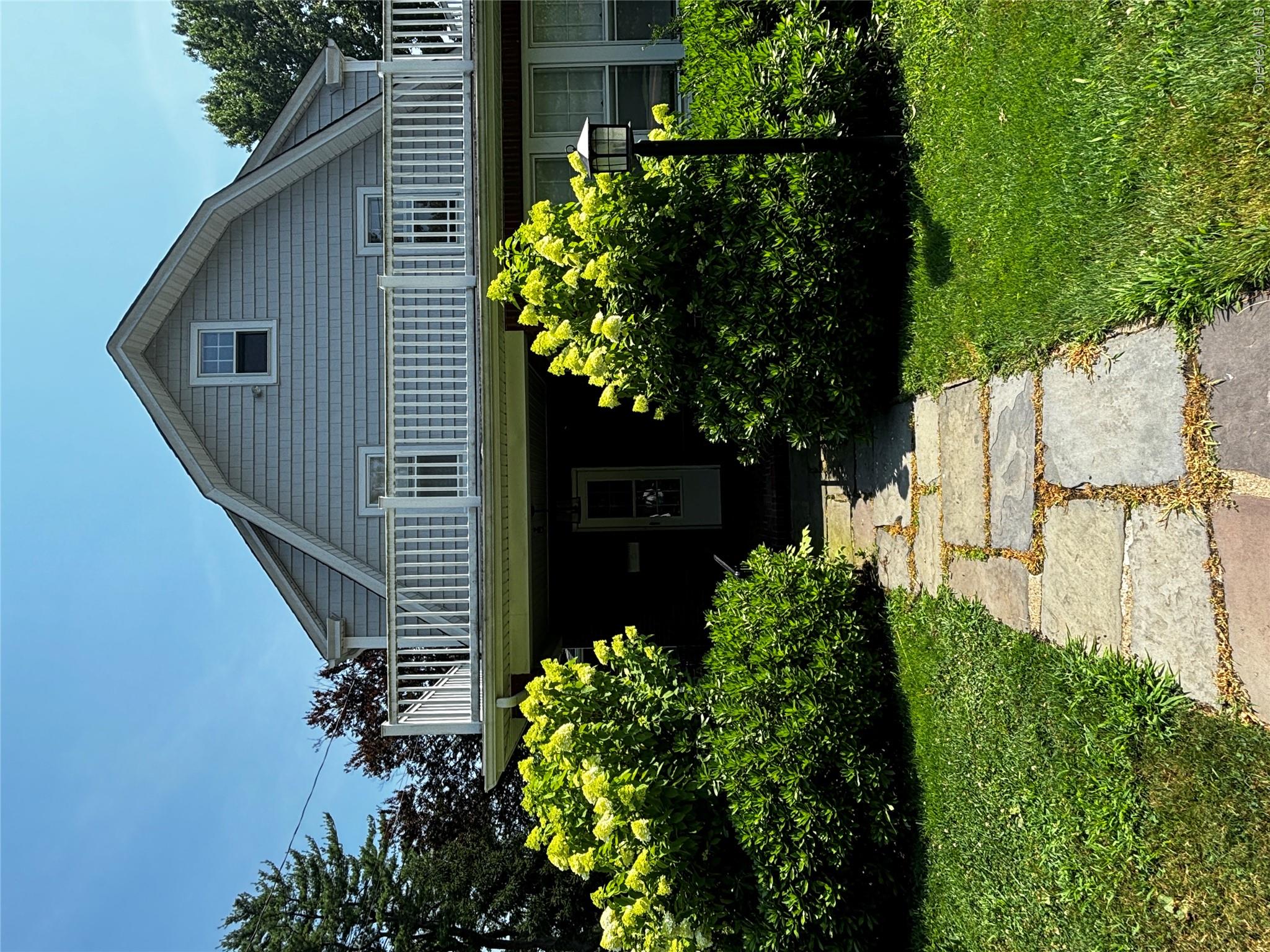 160 West Neck Road Huntington, NY 11743 - Photo 4 of 7 View of front of home featuring a gambrel roof