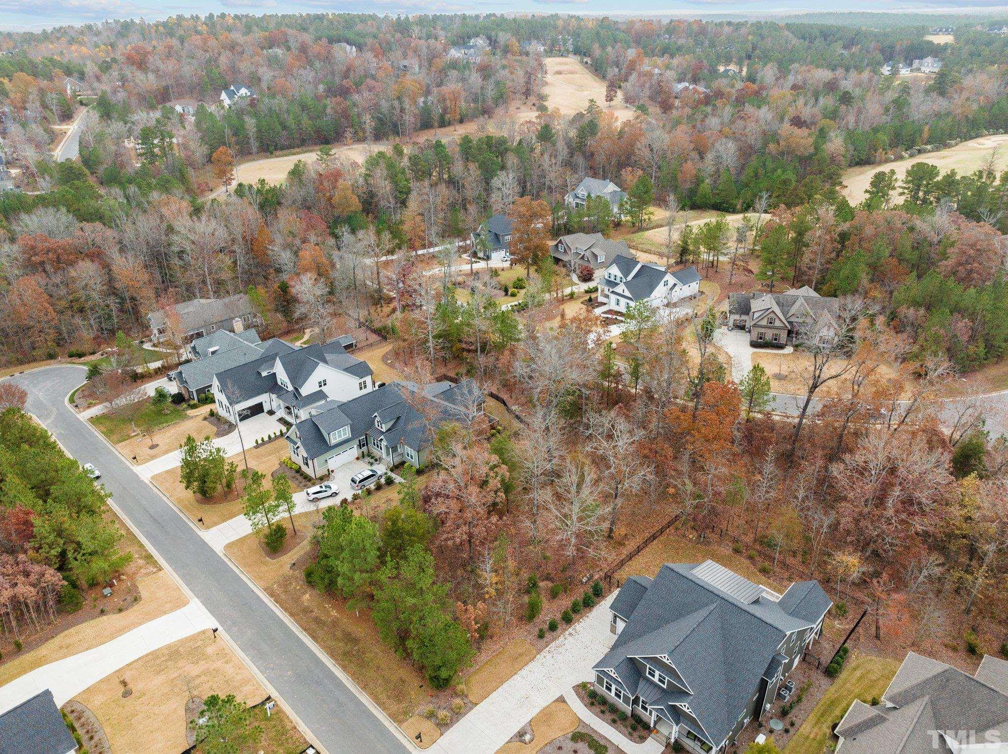 162 Lookout Ridge Pittsboro, NC 27312 - Photo 18 of 37 an aerial view of residential houses with outdoor space