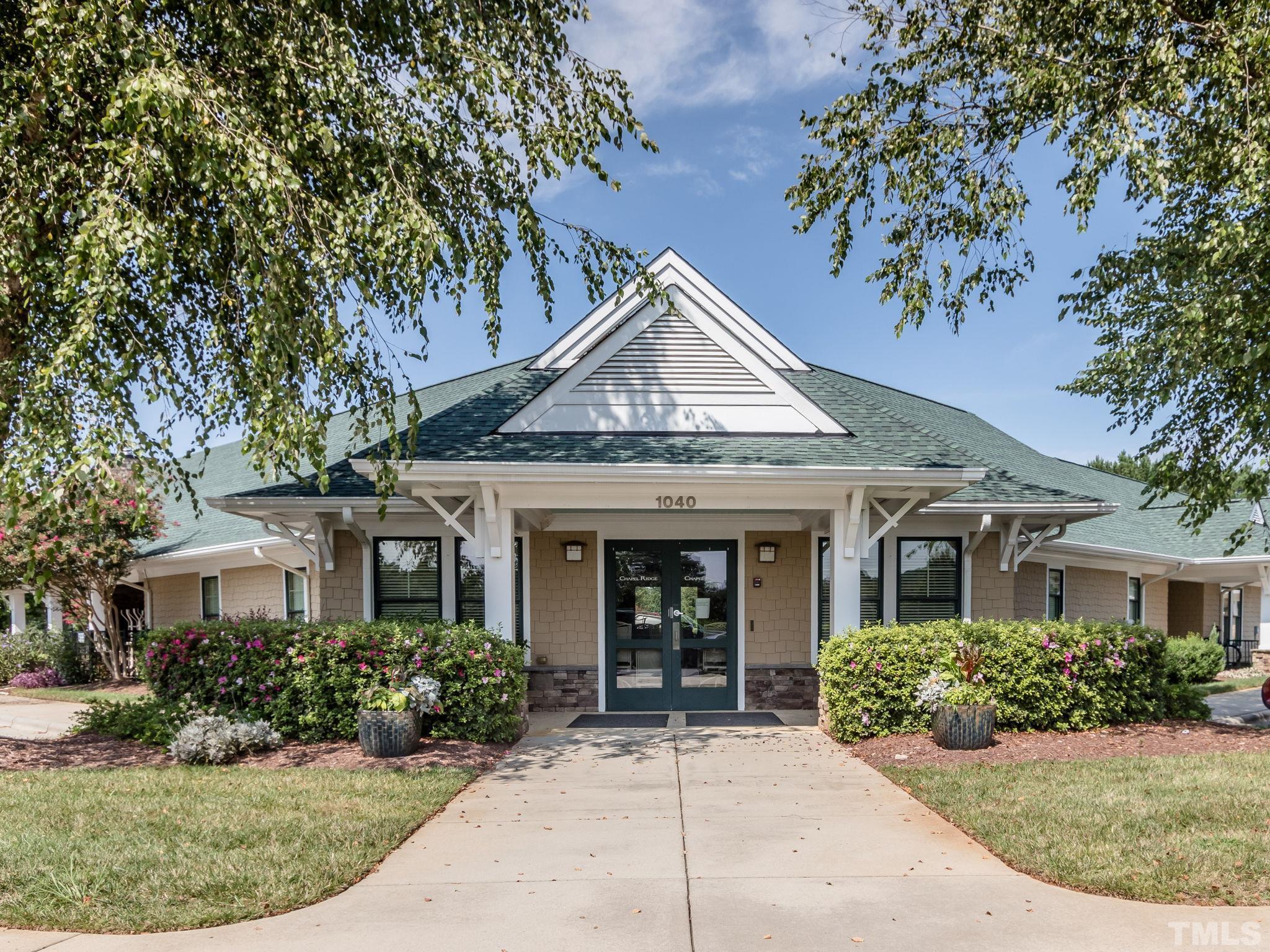 162 Lookout Ridge Pittsboro, NC 27312 - Photo 22 of 37 front view of a house with a yard