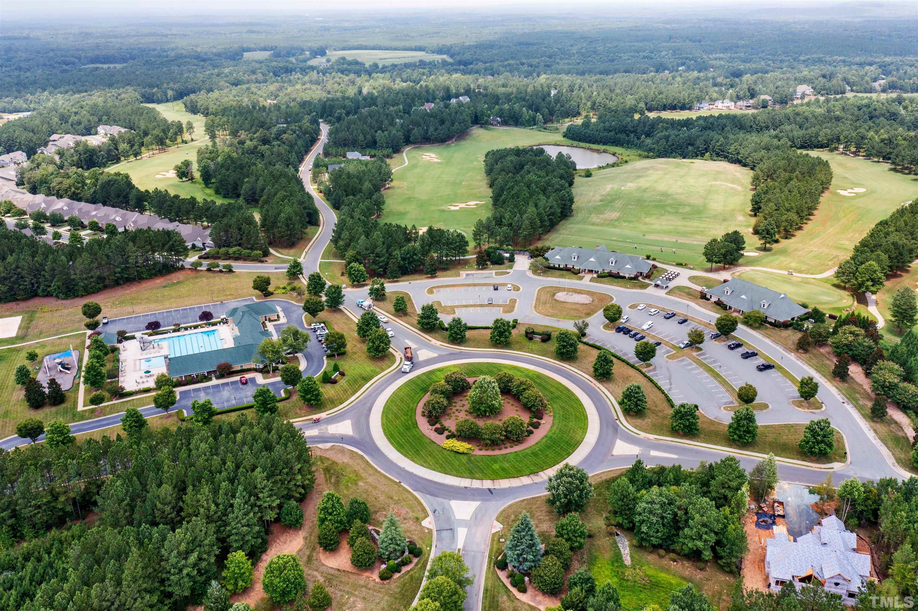 162 Lookout Ridge Pittsboro, NC 27312 - Photo 25 of 37 an aerial view of a house with outdoor space and a lake view