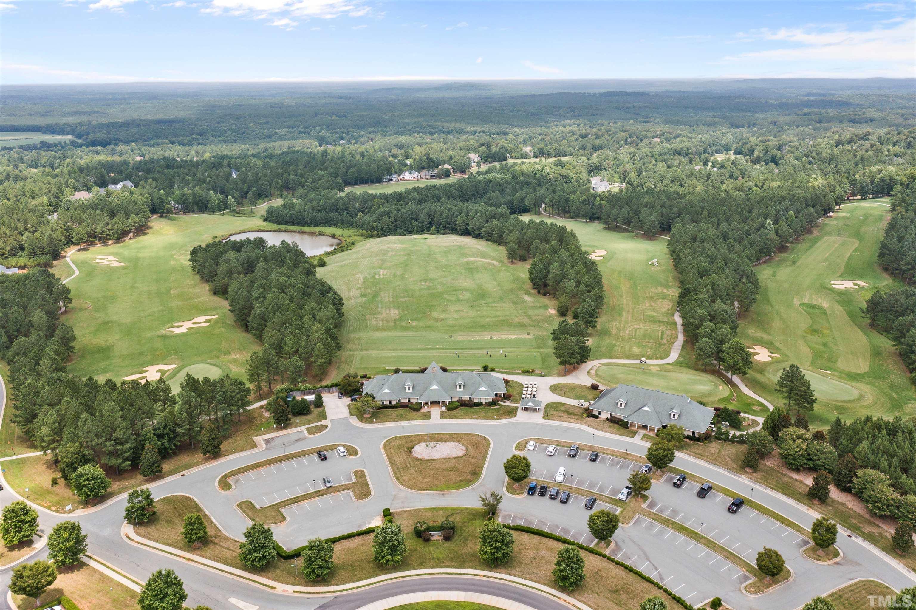 162 Lookout Ridge Pittsboro, NC 27312 - Photo 27 of 37 an aerial view of multiple house with yard