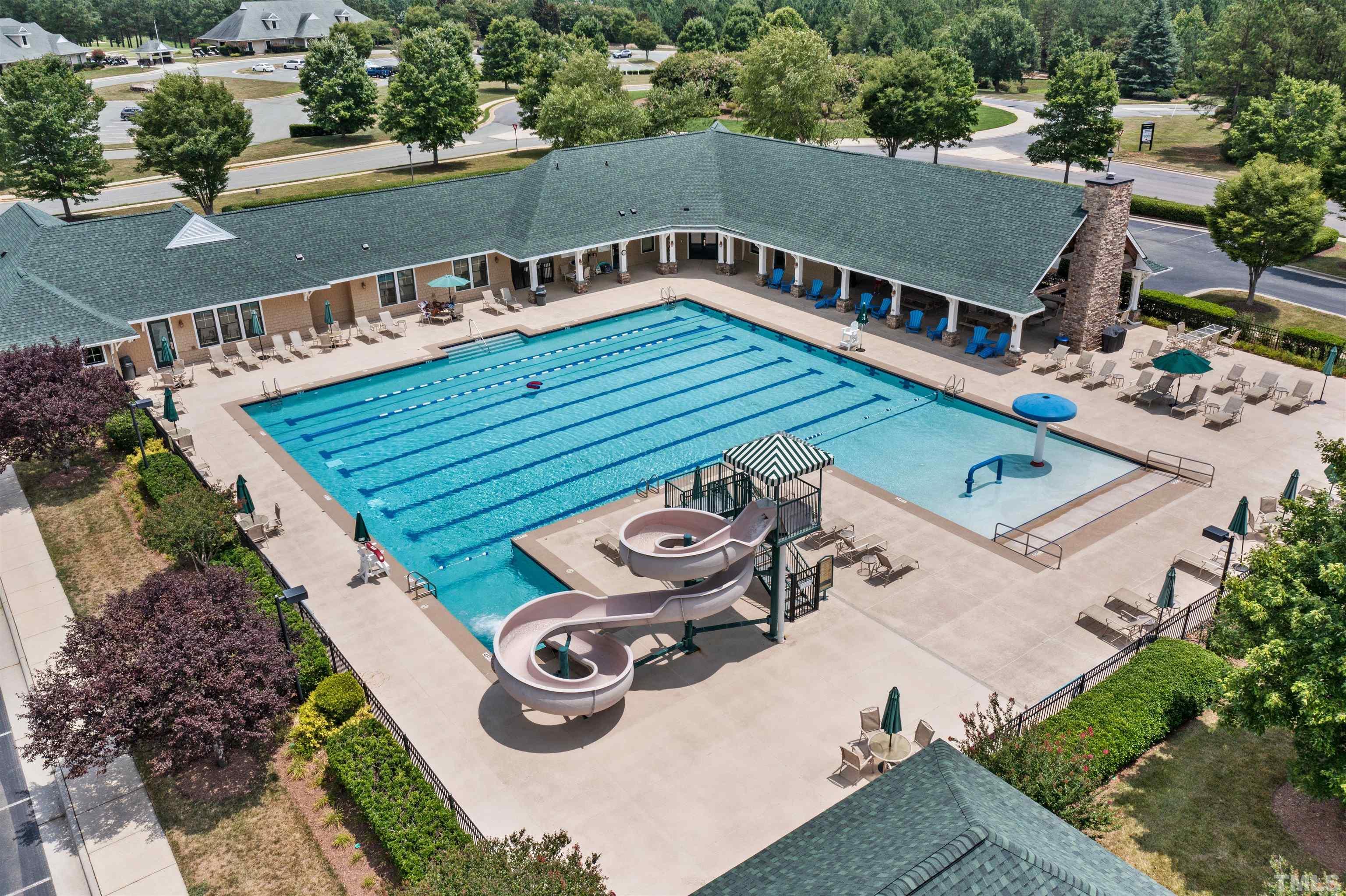 162 Lookout Ridge Pittsboro, NC 27312 - Photo 29 of 37 an aerial view of a house with garden space and car parked