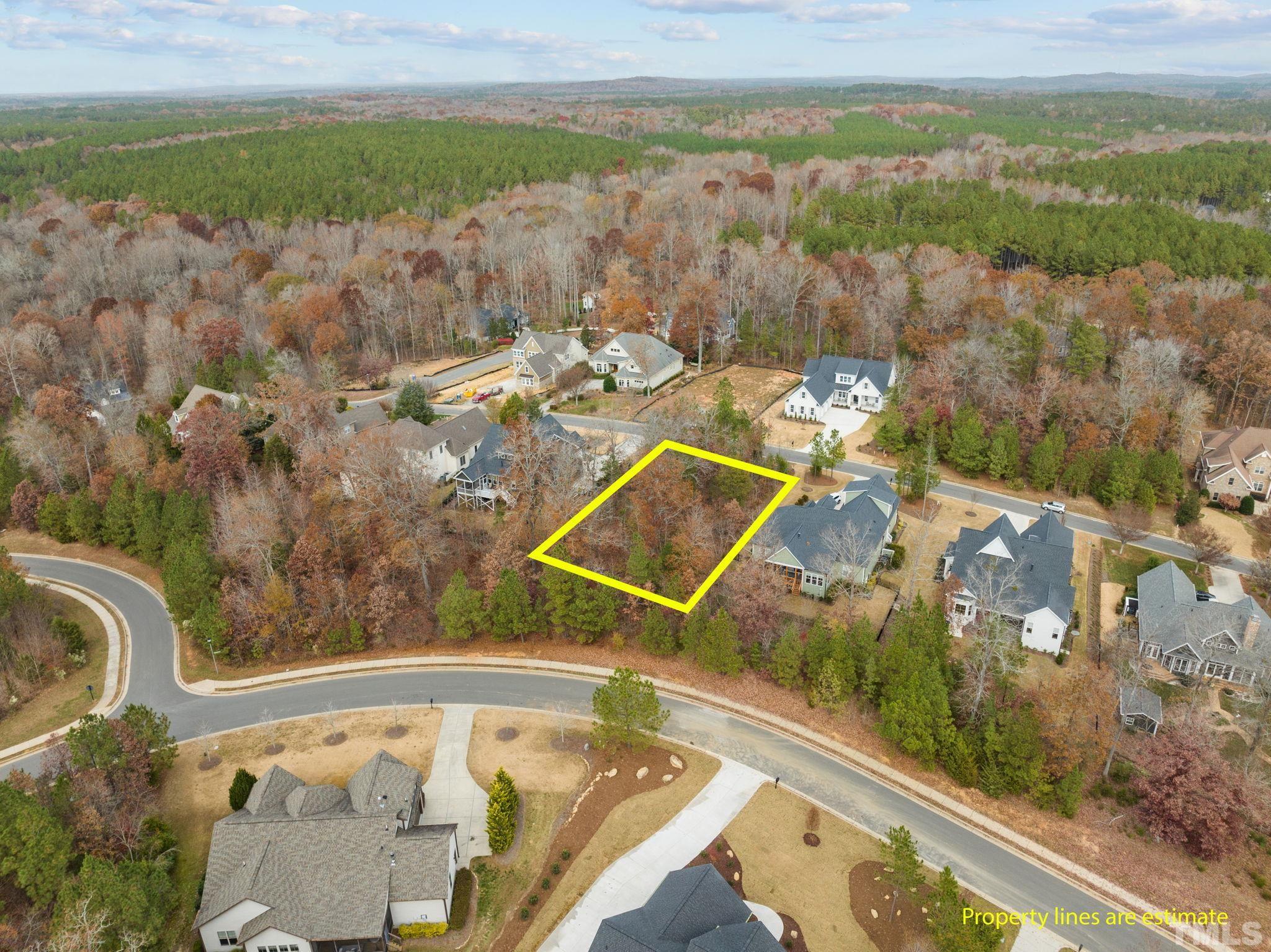 162 Lookout Ridge Pittsboro, NC 27312 - Photo 34 of 37 a view of a lake with a mountain