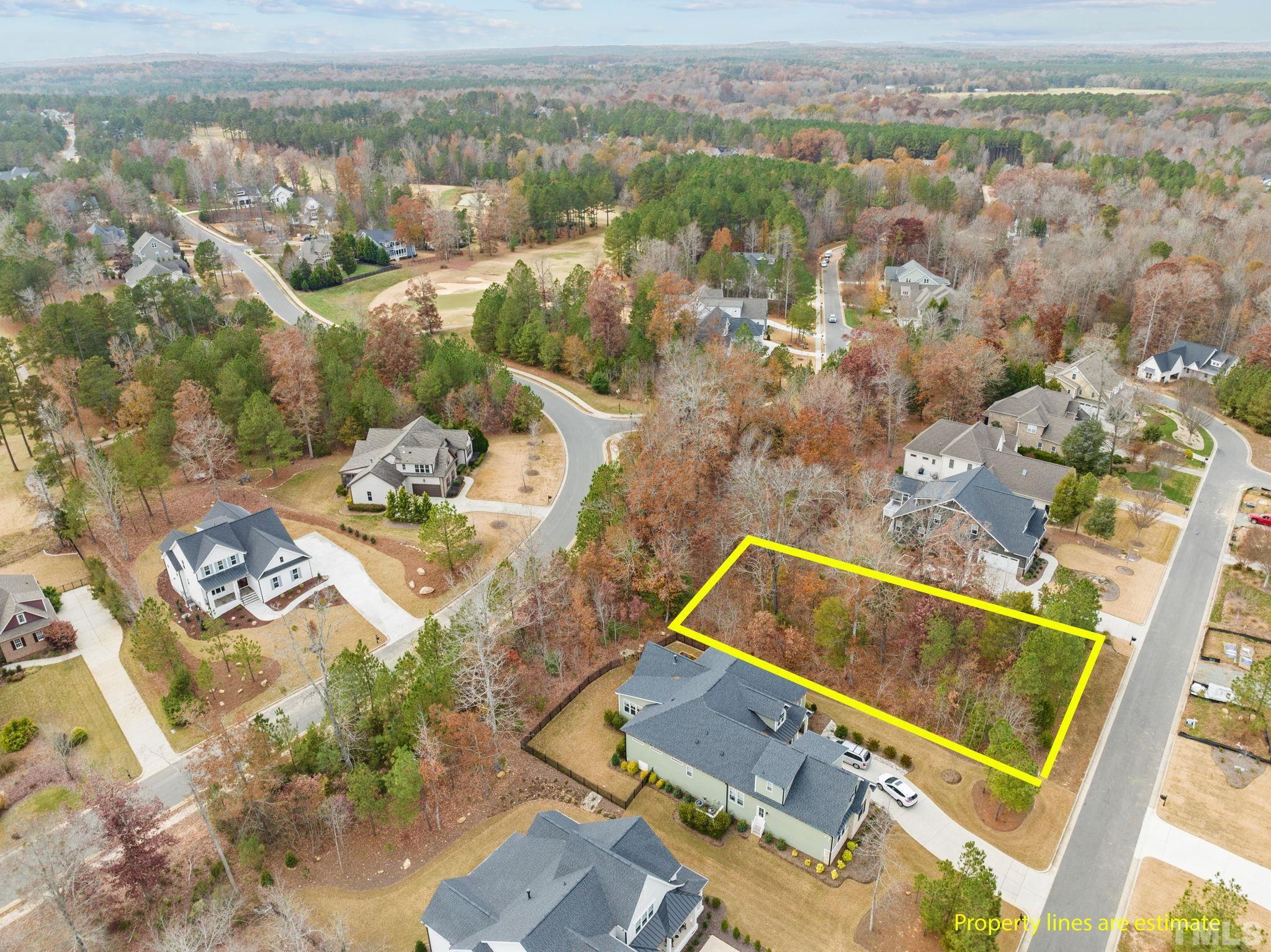 162 Lookout Ridge Pittsboro, NC 27312 - Photo 35 of 37 an aerial view of a house with a outdoor space