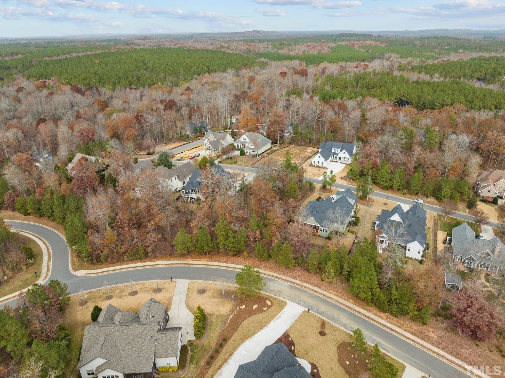 162 Lookout Ridge Pittsboro, NC 27312 - Photo 8 of 37 a view of a lake with a mountain