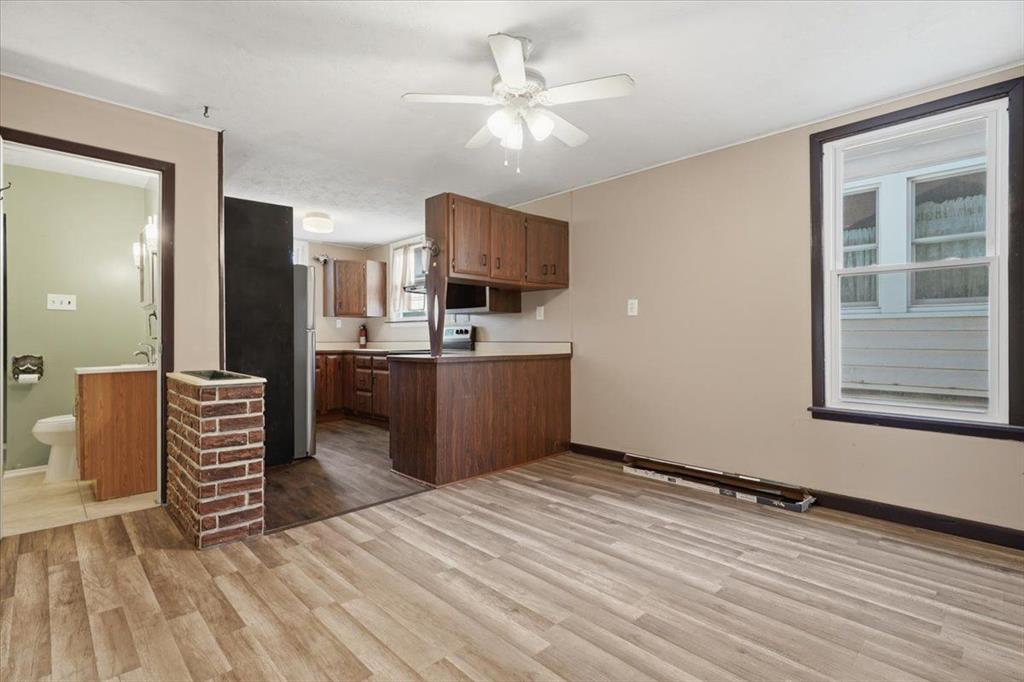 15 Division Street Pittsburgh, PA 15205 - Photo 21 of 44 a room with a bed and a television