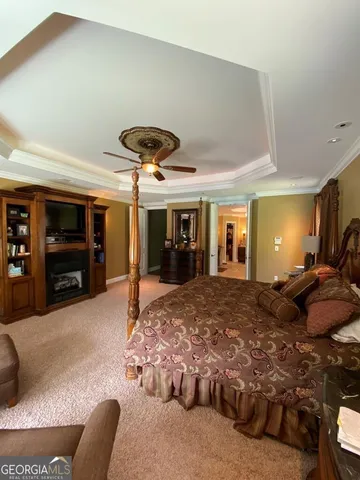 a living room with furniture and a ocean view