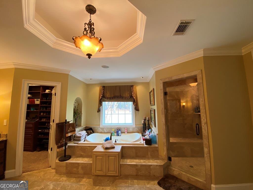 3 Chestnut Road Hazlehurst, GA 31539 - Photo 22 of 66 a living room with fireplace furniture and a chandelier
