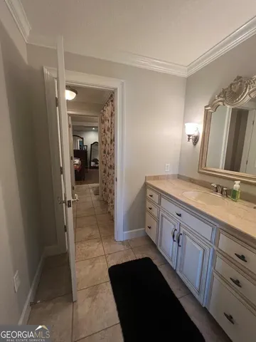 an aerial view of residential house with yard and swimming pool