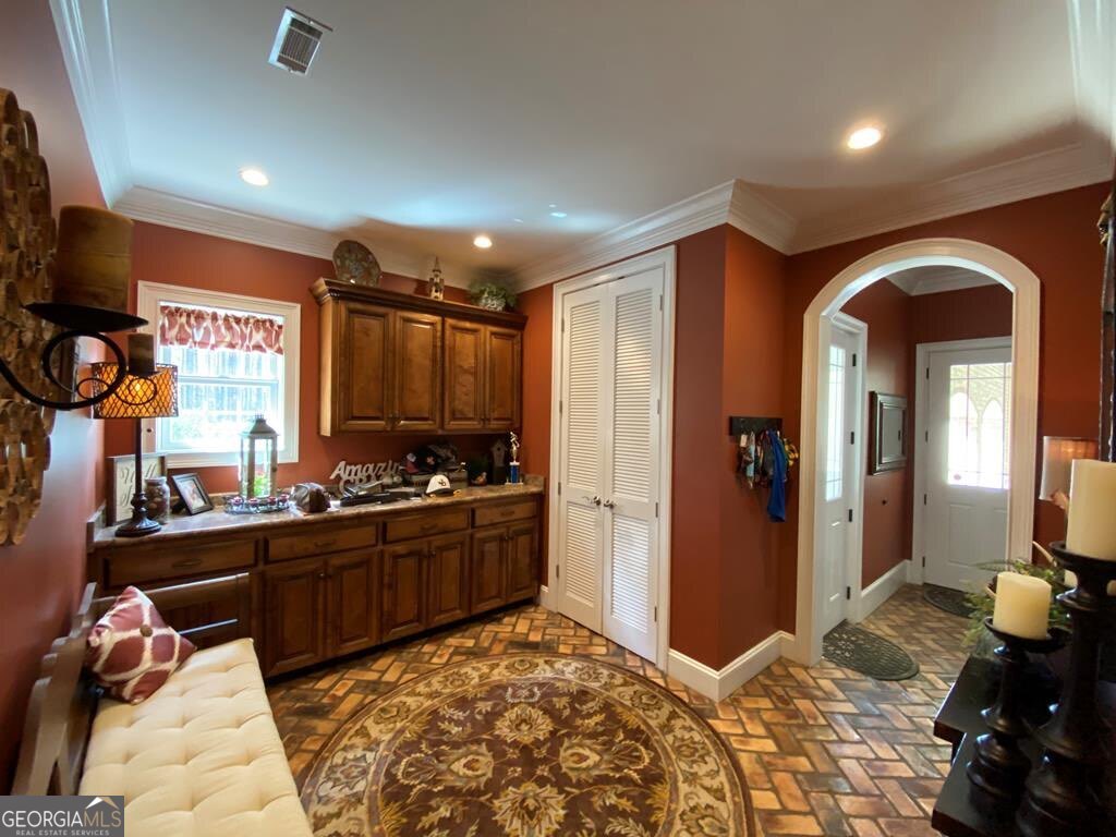 3 Chestnut Road Hazlehurst, GA 31539 - Photo 37 of 66 a bedroom with furniture and a large window