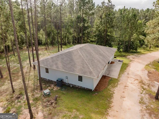 a view of a swimming pool with a lounge chairs