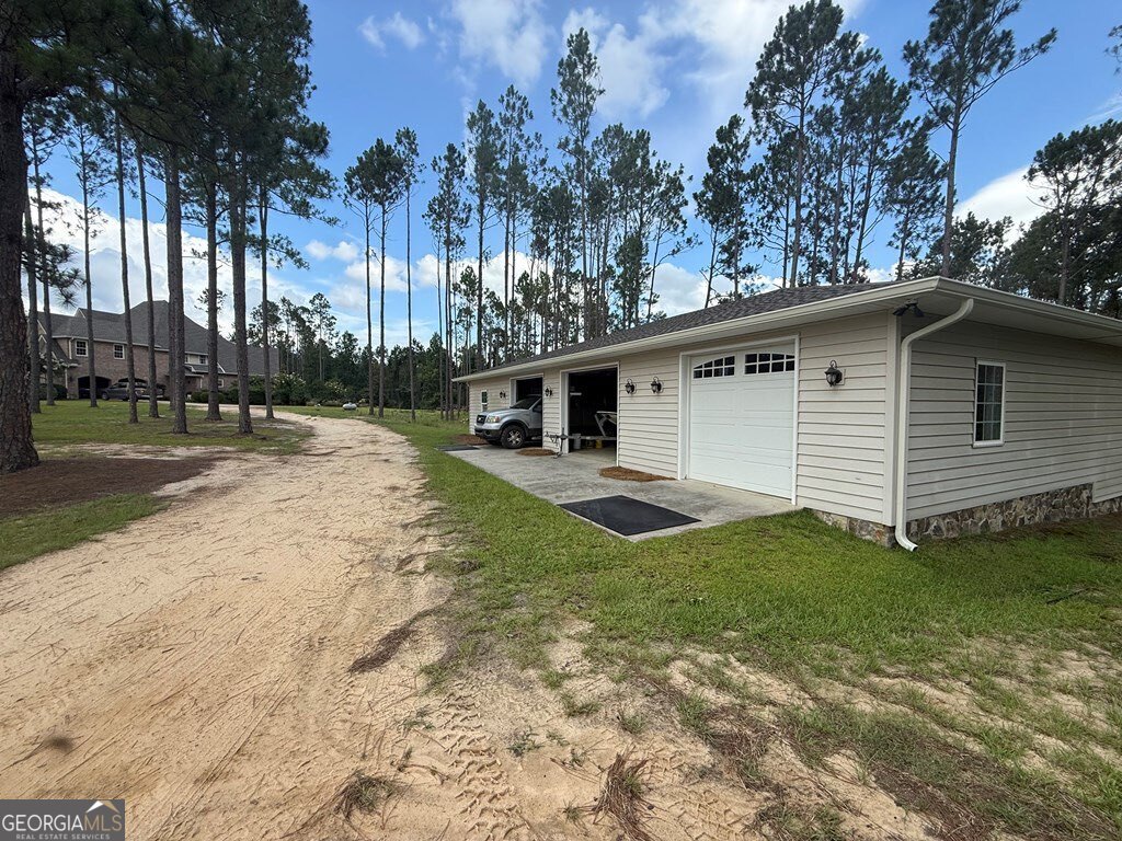 3 Chestnut Road Hazlehurst, GA 31539 - Photo 40 of 66 front view of a house with a yard