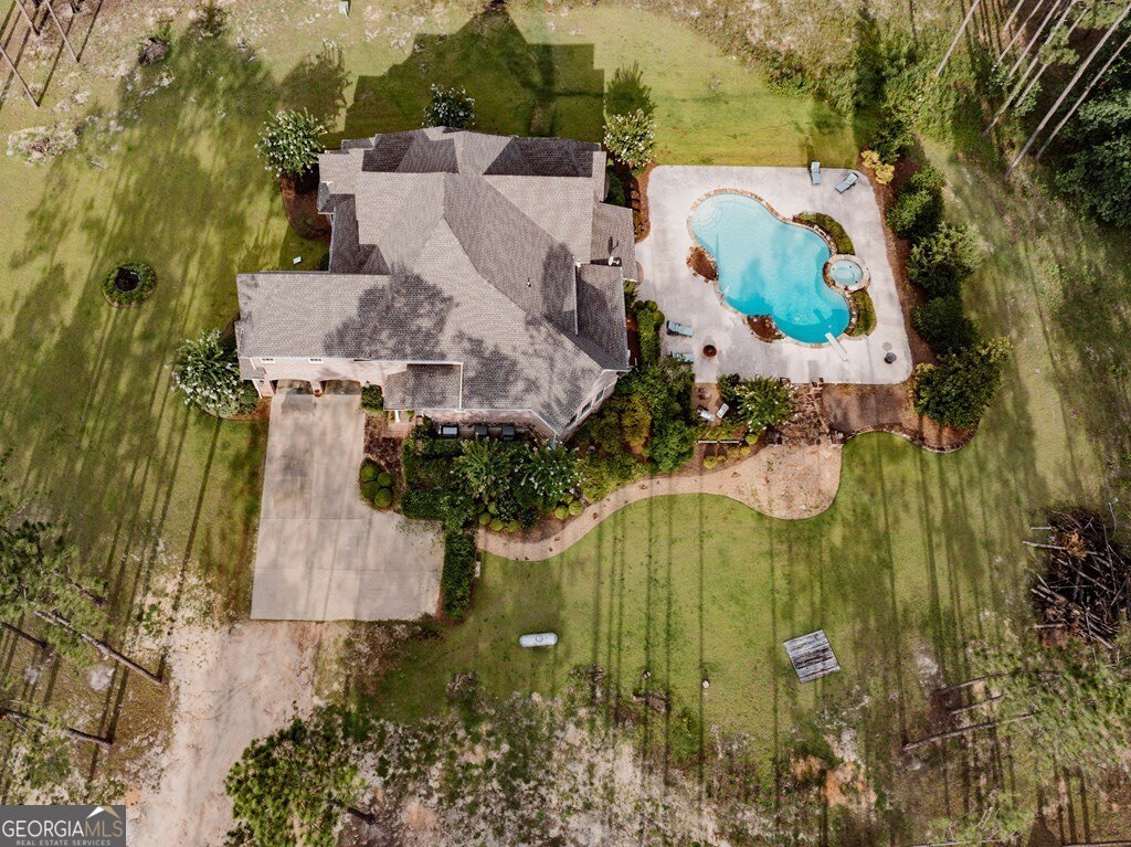 3 Chestnut Road Hazlehurst, GA 31539 - Photo 50 of 66 an aerial view of residential house with yard and swimming pool