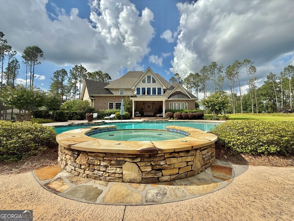 3 Chestnut Road Hazlehurst, GA 31539 - Photo 58 of 66 a view of a house with a yard