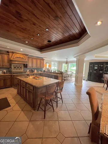 a bathroom with a sink a mirror and a toilet