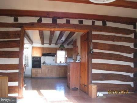21535 Middletown Road Freeland, MD 21053 - Photo 5 of 23 Family Rm to Kitchen with original exposed beams