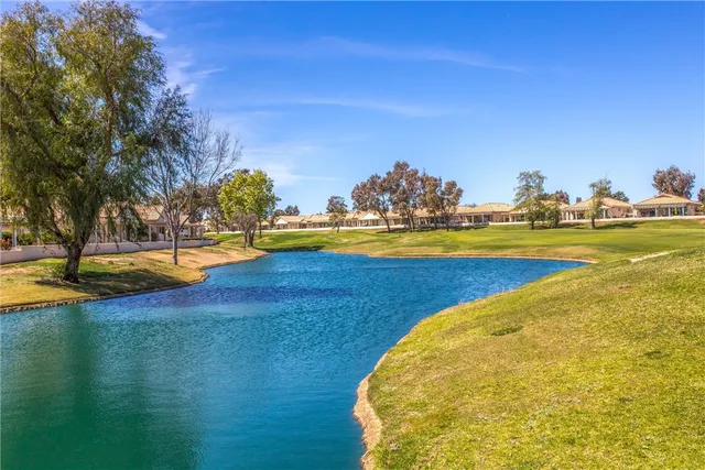 a view of a swimming pool with an ocean view