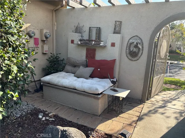 a outdoor living space with furniture and garden view