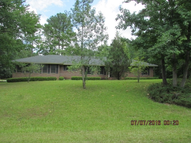 5835 Huddersfield Road Macon, GA 31210 - Photo 1 of 19 a view of a house with a backyard