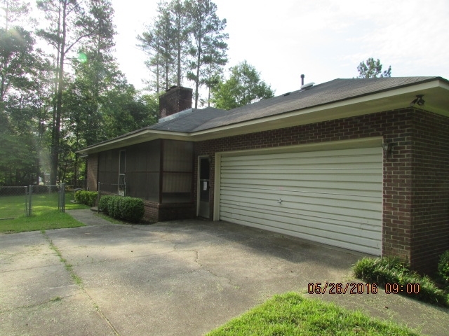 5835 Huddersfield Road Macon, GA 31210 - Photo 2 of 19 a view of a house with a yard